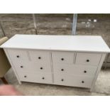 A MODERN WHITE PAINTED CHEST OF FOUR SHORT + FOUR LONG DRAWERS