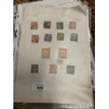 A QUANTITY OF CHINESE STAMPS