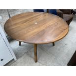 A BELIEVED ERCOL DROP-LEAF DINING TABLE AND TWO RETRO M MILO DINING CHAIRS