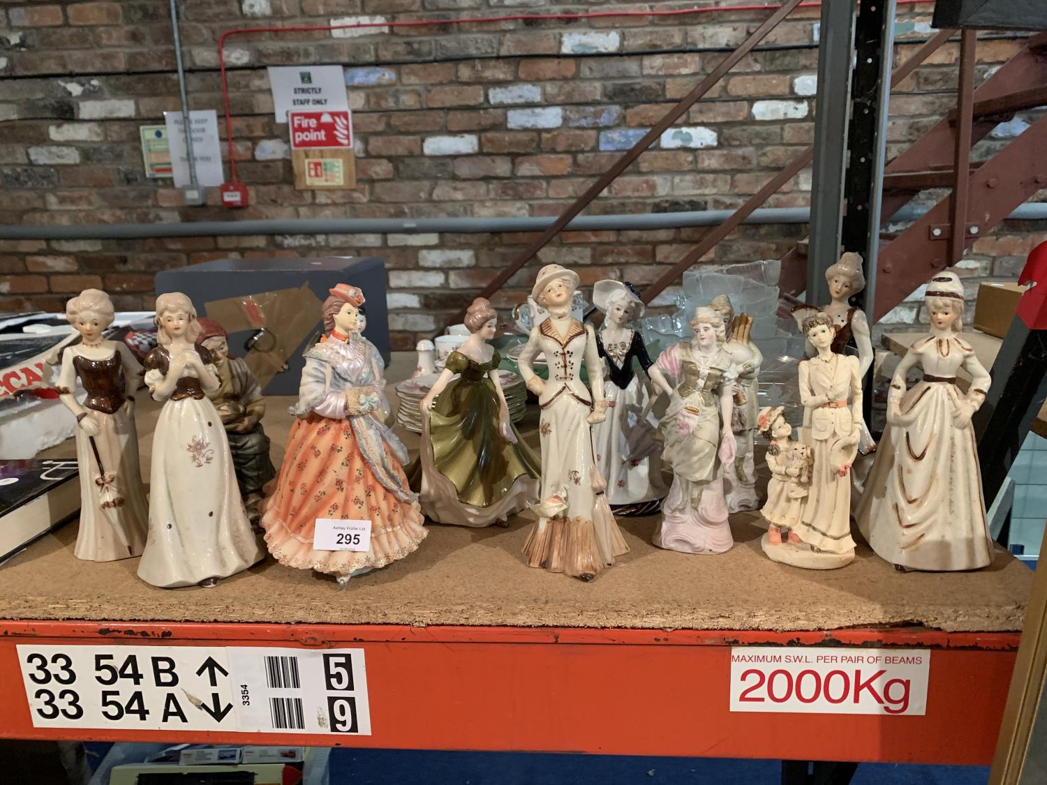 A COLLECTION OF VARIOUS LADY FIGURINES