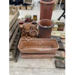 A COLLECTION OF TERRACOTTA ITEMS TO INCLUDE TROUGHS, POTS ETC (SOME A/F)