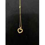 A 9CT GOLD DIAMOND SET HEART PENDANT AND CHAIN, APPROX TOTAL GROSS WEIGHT 1.5 GRAMS