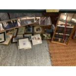 A LARGE COLLECTION OF FRAMED PICTURES AND MIRRORS