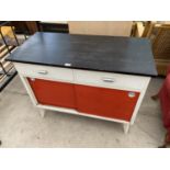 A RETRO KITCHEN CABINET WITH TWO DOORS AND TWO DRAWERS