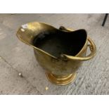 A VINTAGE BRASS COAL SCUTTLE