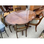 A REGENCY STYLE DINING TABLE AND FOUR CHAIRS