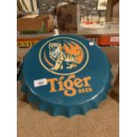 A LARGE TIGER BEER BOTTLE TOP WALL DISPLAY SIGN