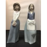 TWO NAO FEMALE FIGURINES