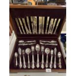 A WOODEN CASED CANTEEN OF CUTLERY, EIGHT PLACES