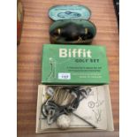 A VINTAGE BOXED BIFFIT GOLF SET AND BOXED SYRINGE