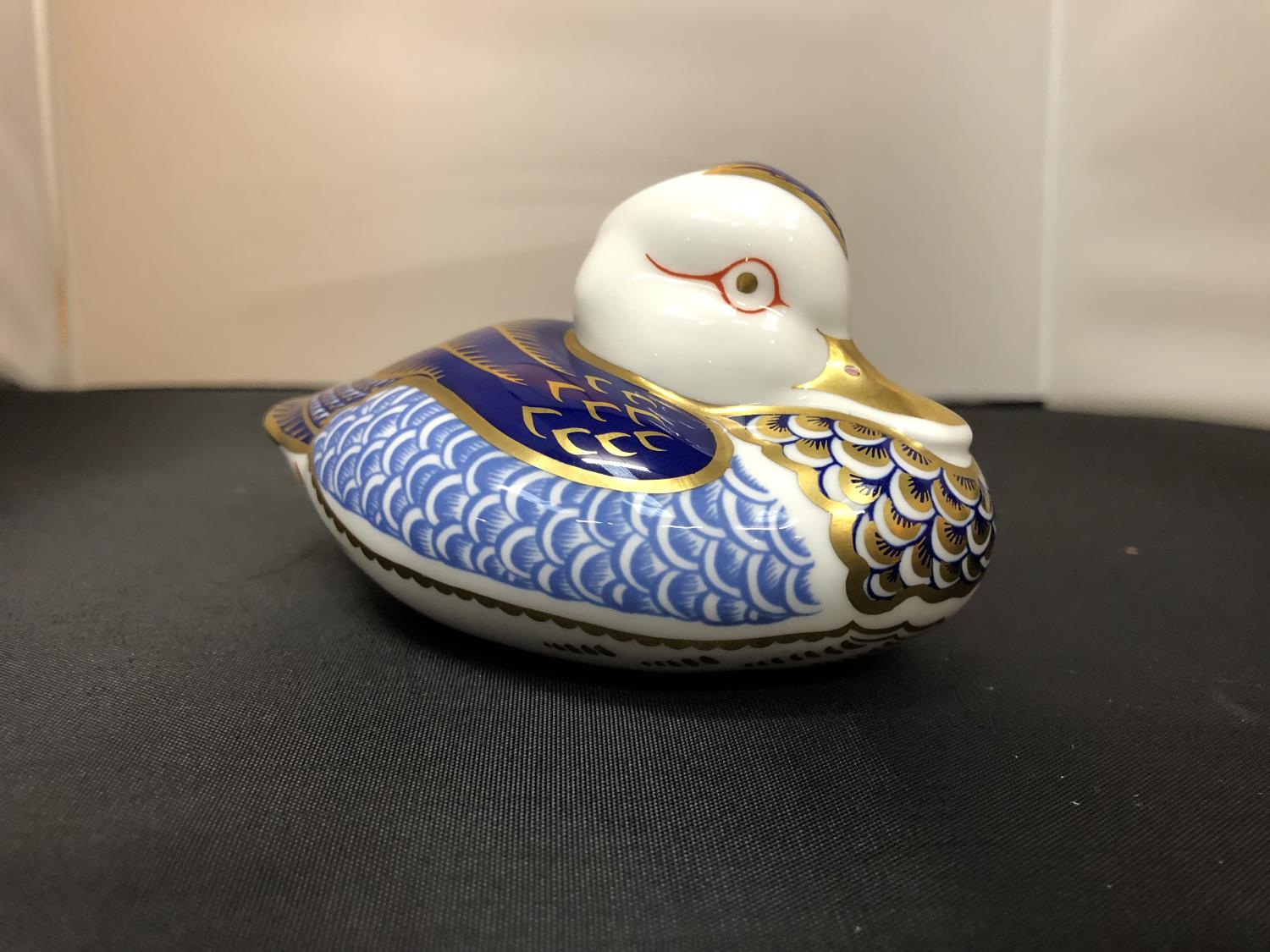 A ROYAL CROWN DERBY IMARI DUCK WITH GOLD STOPPER