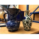 A ROYAL DOULTON BLUE AND WHITE VASE WITH HANDLES AND A FLORAL STUDIO VASE