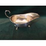 A HALLMARKED 1917 LONDON SILVER SAUCE BOAT - MAKER HORACE WOODWARD & CO, WEIGHT 3 oz APPROX