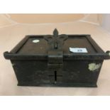 A CAST IRON COMMUNION BOX