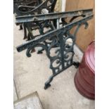 A SET OF CAST IRON TABLE ENDS