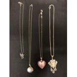 FOUR SILVER NECKLACES