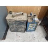 A VINTAGE ESSO BLUE PARAFFIN CAN AND A VINTAGE PRATTS PETROL CAN (NO LID)