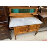 AN EARLY 20TH CENTURY SATINWOOD WASHSTAND WITH TWO DOORS, MARBLE TOP AND TILED SPLASHBACK