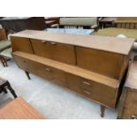 A PORTWOOD FURNITURE RETRO TEAK SIDEBOARD WITH TWO DOORS AND SIX DRAWERS
