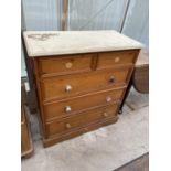 A VICTORIAN STYLE PINE CHEST OF TWO SHORT AND THREE LONG DRAWERS