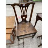 A VICTORIAN OAK DINING CHAIR WITH SOLID SEAT