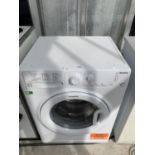 A HOTPOINT AQUARIUS WASHING MACHINE BELIEVED IN WORKING ORDER - NO WARRANTY