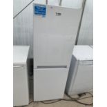 A BEKO FRIDGE FREEZER AS NEW AND VERY CLEAN