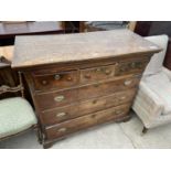 A GEORGE III OAK CHEST OF THREE SHORT AND THREE LONG DRAWERS