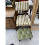 AN OAK PARLOUR CHAIR AND AN UPHOLSTERED FOOTSTOOL ON CABRIOLE SUPPORTS