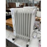 THREE OIL FILLED RADIATORS