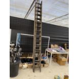 TWO TWO SECTION WOODEN LADDERS