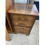 AN OAK FILING CABINET WITH TWO DRAWERS