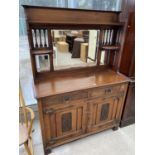 A MAHOGANY ART NOUVEAU SIDEBOARD WITH TWO DOORS HAVING EMBOSSED COPPER HINGES, TWO DRAWERS AND UPPER