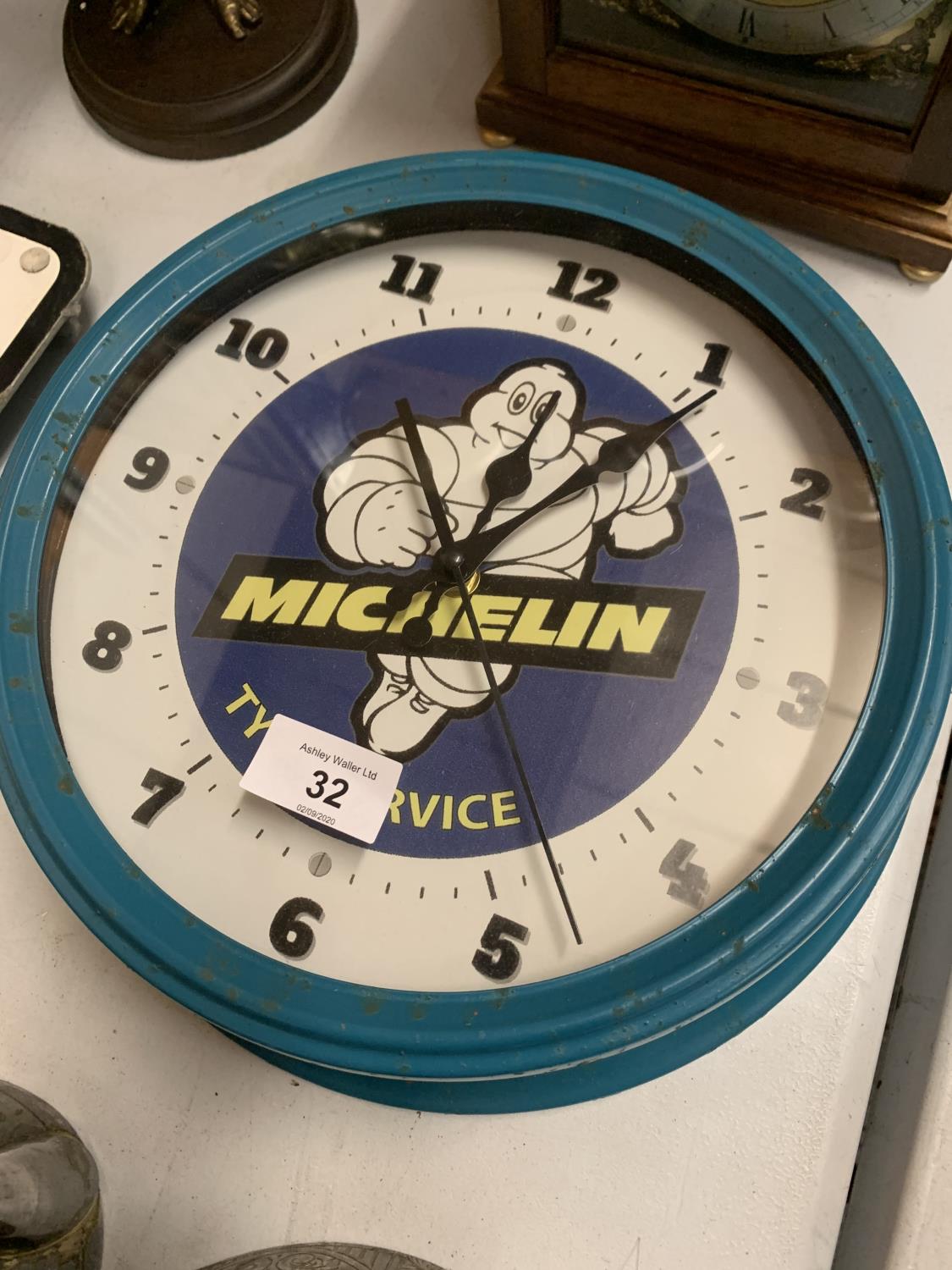 A MICHELIN ADVERTISING WALL CLOCK