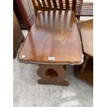 A MAHOGANY COFFEE TABLE