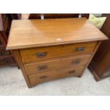 A VICTORIAN SATINWOOD CHEST OF THREE DRAWERS