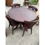 A MAHOGANY DINING TABLE AND FOUR CHAIRS