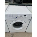AN INDESIT WASHING MACHINE BELIEVED TO BE IN WORKING ORDER - NO WARRANTY