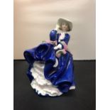 A ROYAL DOULTON TOP O' THE HILL BLUE FIGURINE