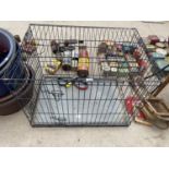 A LARGE DOG CRATE AND COLLARS