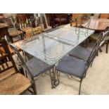 A MODERN GLASS TOP DINING TABLE ON METAL BASE AND FOUR MATCHING CHAIRS