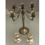 AN ORNATE SILVER PLATE CANDELABRA AND TWO CANDLESTICKS