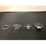 FOUR SILVER RINGS