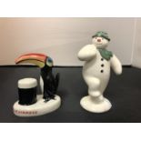 A CARLTON WARE GUINESS TOUCAN FIGURINE AND A ROYAL DOULTON THE SNOWMAN FIGURINE WITH SMALL CHIP TO