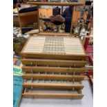 A LARGE WOODEN JEWELLERY BOX WITH FIVE DRAWERS