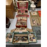 THREE JEWELLERY BOXES CONTAINING A QUANTITY OF COSTUME JEWELLERY