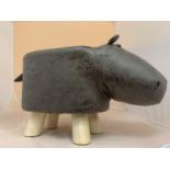 A BROWN HIPPO FAUX LEATHER FOOTSTOOL