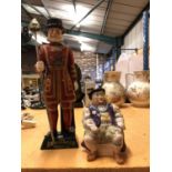 A CARLTON WARE 'THE BEEFEATER YEOMAN' FIGURINE AND A HENRY THE VIII TOBY JUG