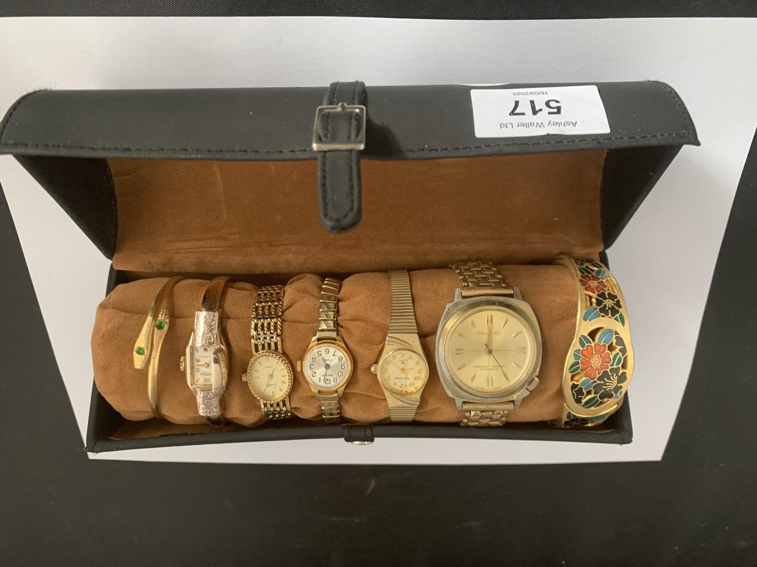 A ROUND WRIST WATCH CASE AND CONTENTS TO INCLUDE FIVE WATCHES AND TWO BANGLES