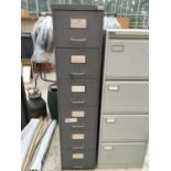 A SIX DRAWER METAL FILING CABINET